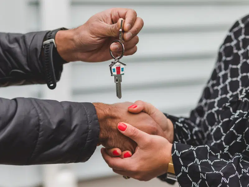These are people exchanging keys.